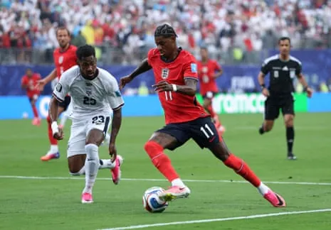 Marcus Rashford runs down the line with Amir Murillo in hot pursuit.
