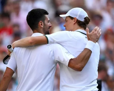 Novak Djokovic congratulates Jannik Sinner on his victory in their Wimbledon semi-final